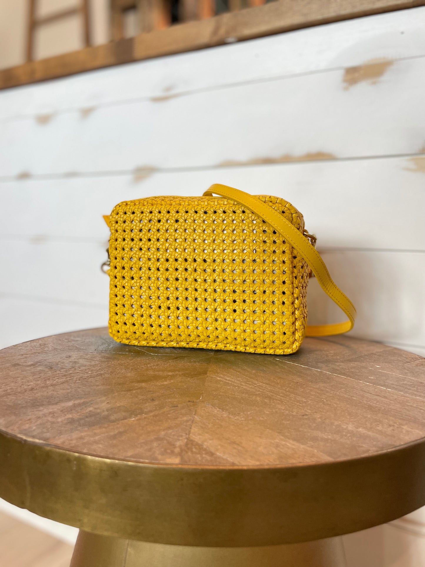 The yellow rattan rectangular midi sac handbag by Clare V