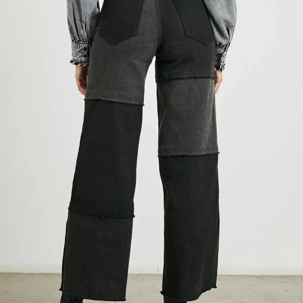 
                      
                        These black patchwork women's jeans from Rails offer a flattering high waisted fit and unique style. 
                      
                    