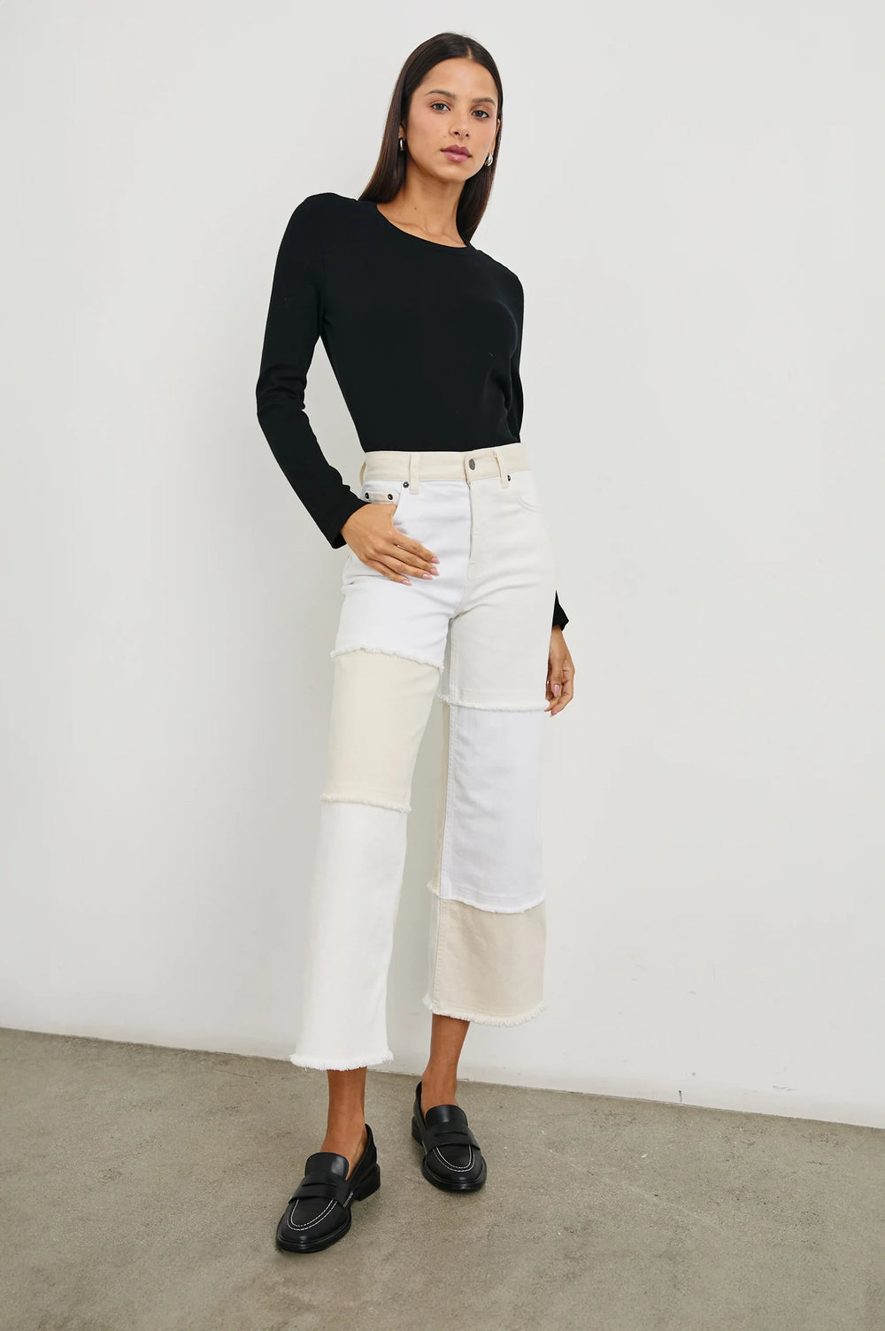 A woman wearing an outfit styled with the Getty Crop Wide Leg Women's Jeans by Rails in the color Ecru Patchwork