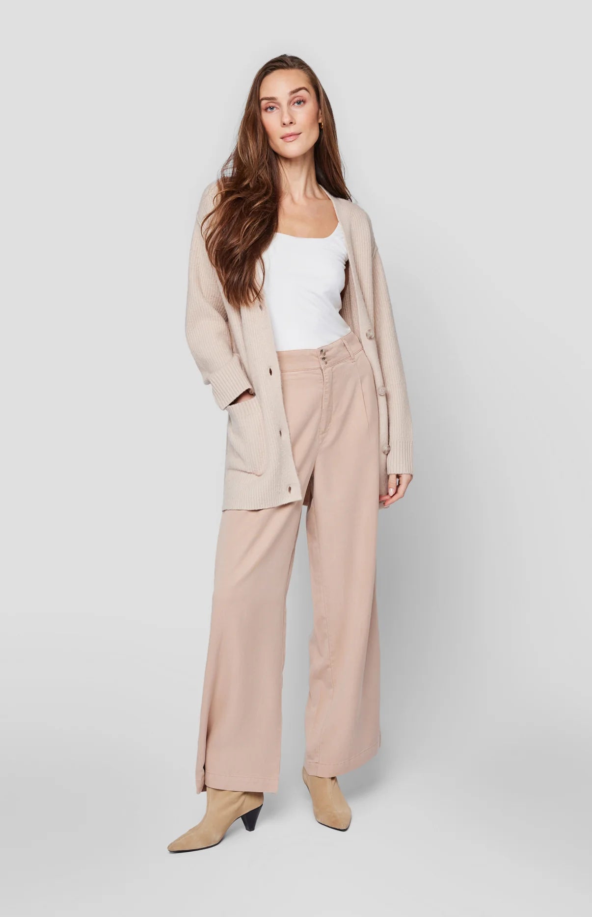 Front view of woman wearing the Tan colored Sabine Wide Leg Trouser Pants by Gentle Fawn
