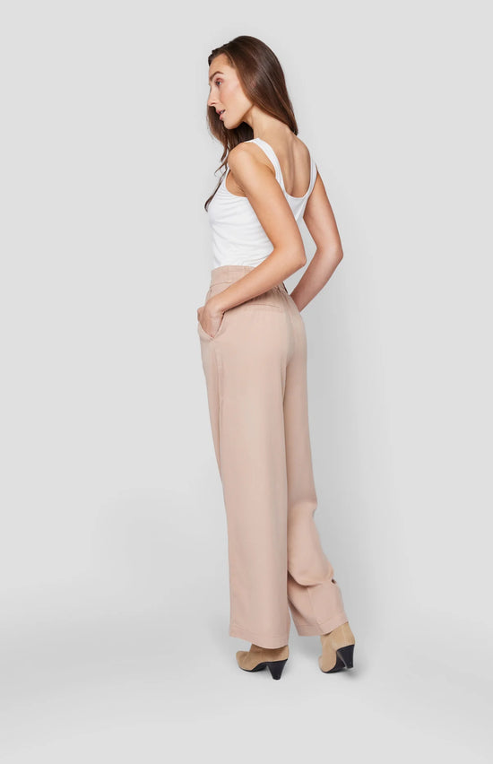 Back view of woman wearing the Tan colored Sabine Wide Leg Trouser Pants by Gentle Fawn