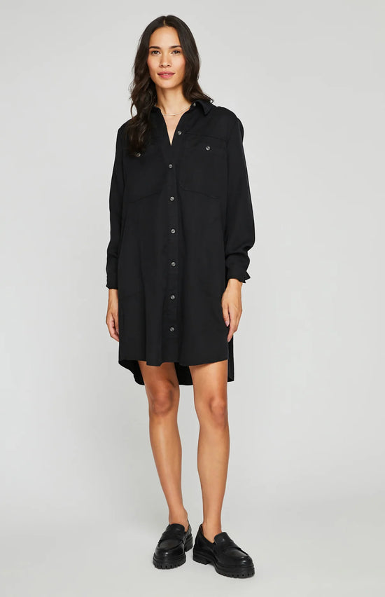 Load image into Gallery viewer, front, full-length view of woman wearing a black button up shirt dress

