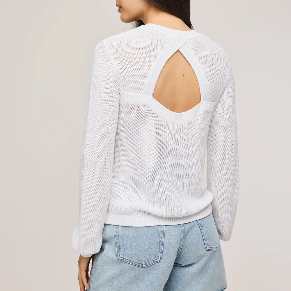 
                      
                        The White Maxine Pullover Sweater by Gentle Fawn features a back cut-out detail
                      
                    