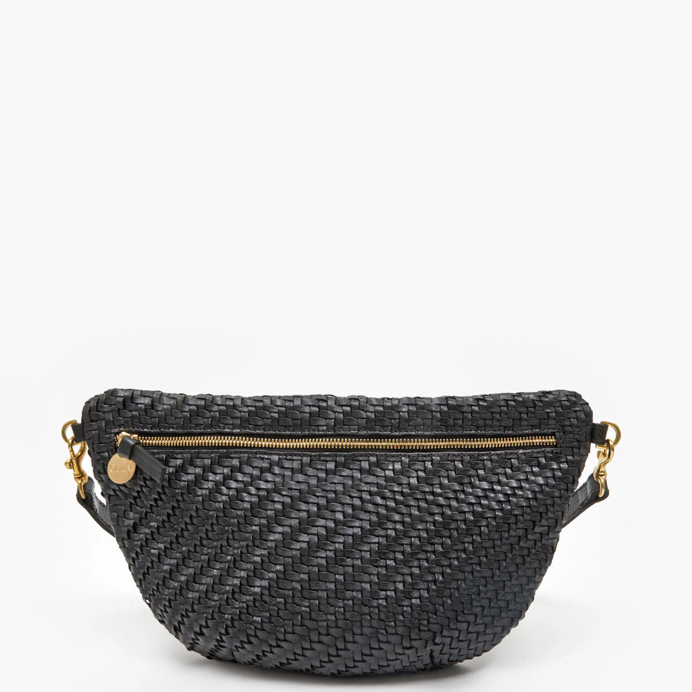 
                      
                        This woven bag from Clare V. can be worn as a crossbody, bum bag or shoulder bag.
                      
                    