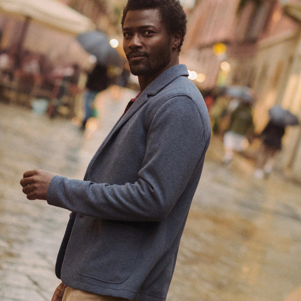 A man wearing the NPacifica Stretch Twill Blazer by Marine Layer
