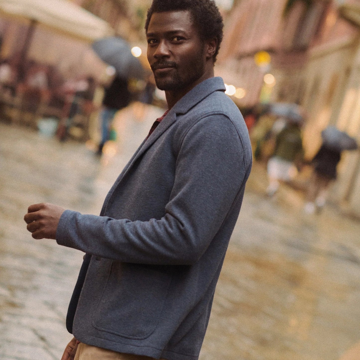 A man wearing the NPacifica Stretch Twill Blazer by Marine Layer
