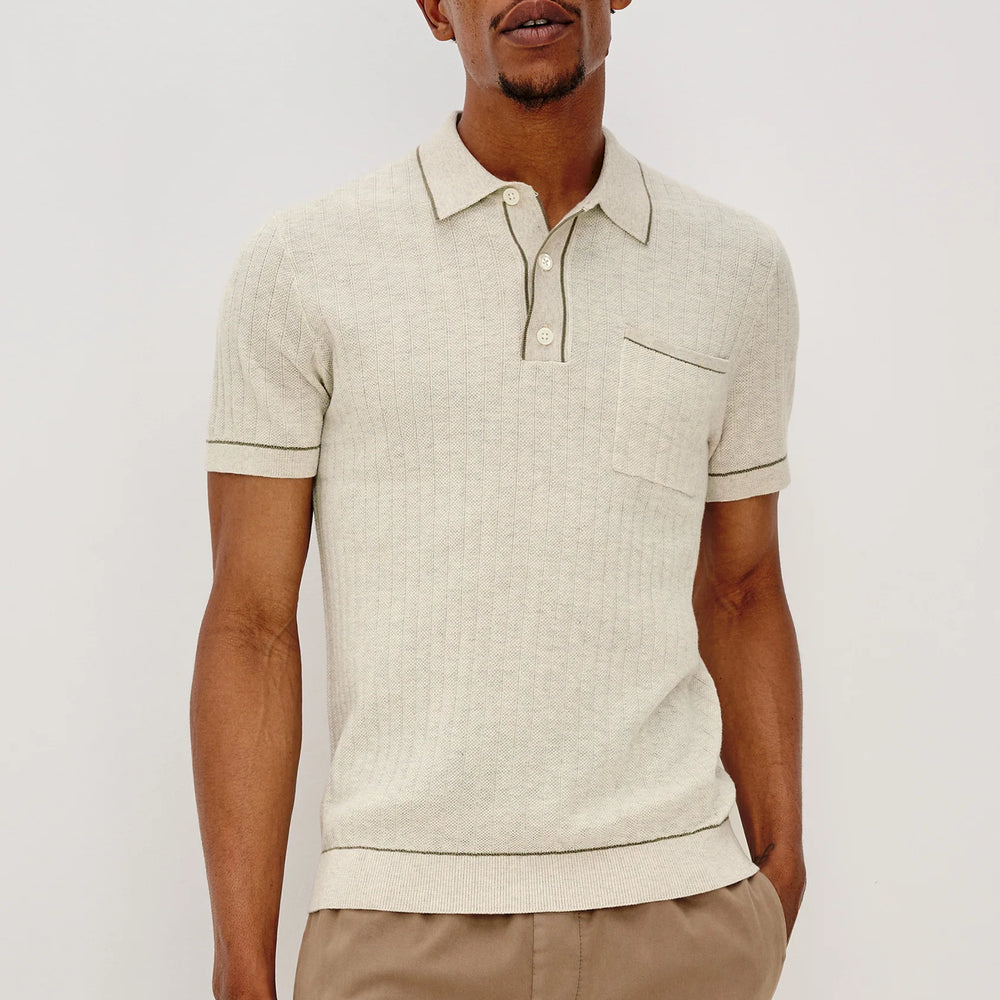 A man wearing the The Rails Hardy Polo Shirt in Oat Heather