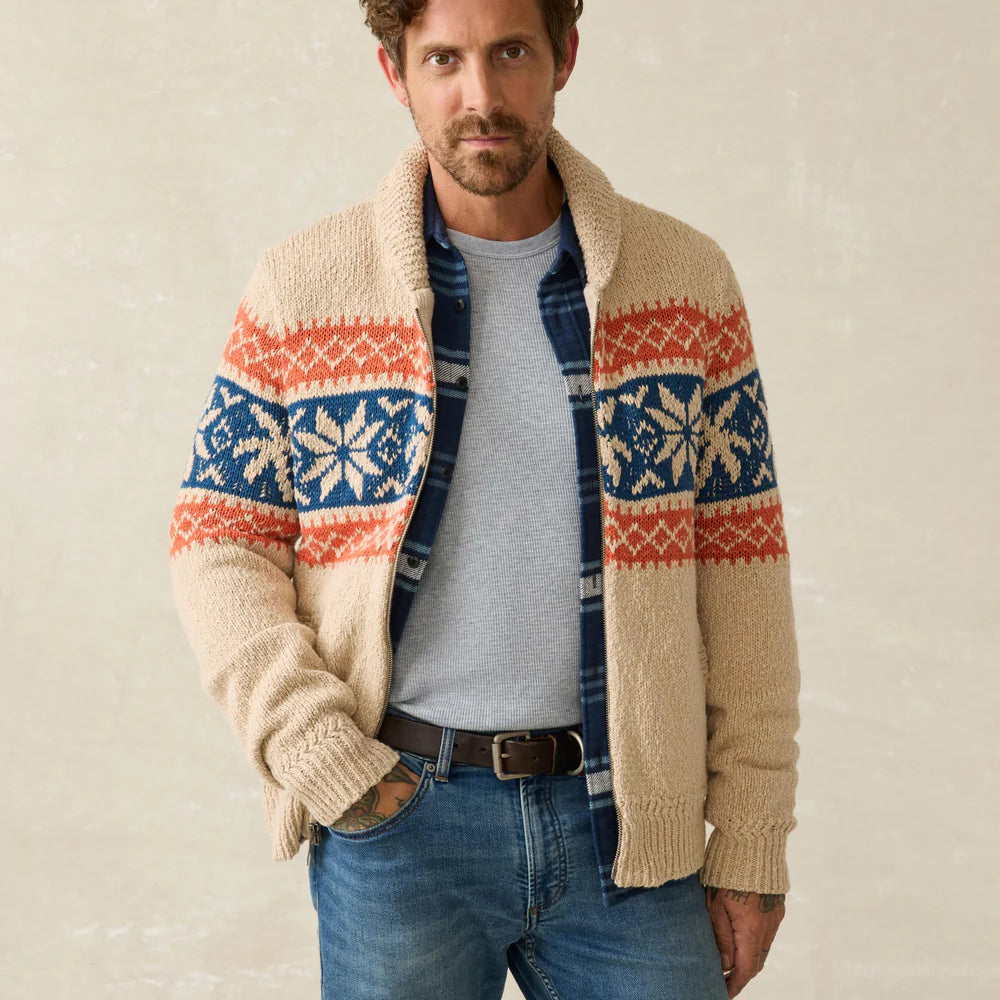 A man wearing Faherty's Surf To Snow Zip Cardigan