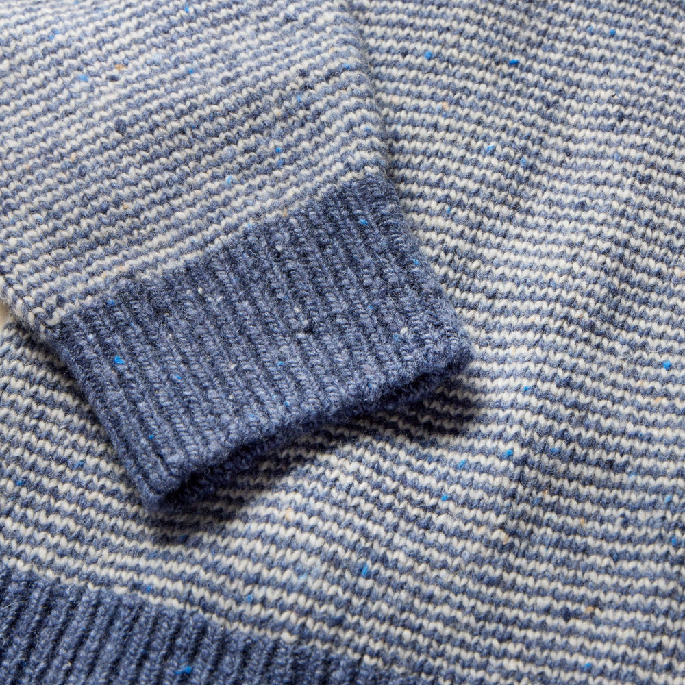 
                      
                        Design detail on Faherty's Donegal Crew Sweater
                      
                    