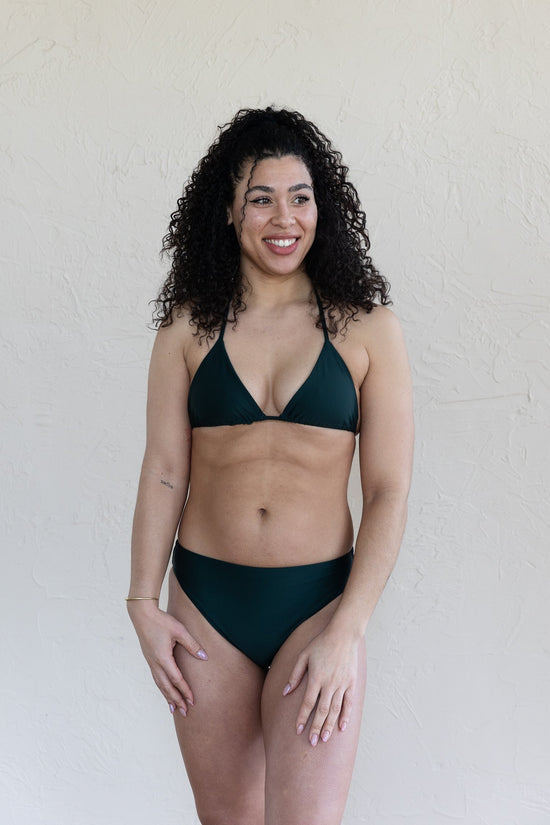 Front view of the dark green luna mid-rise bikini bottoms by Saturday Swimwear