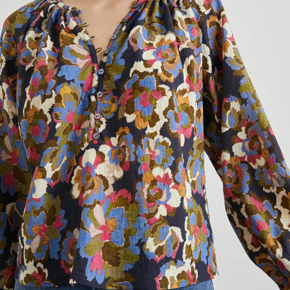 
                      
                        Front design detail on the Navy Wildflower print Indi Long Sleeve Top by the brand Rails
                      
                    