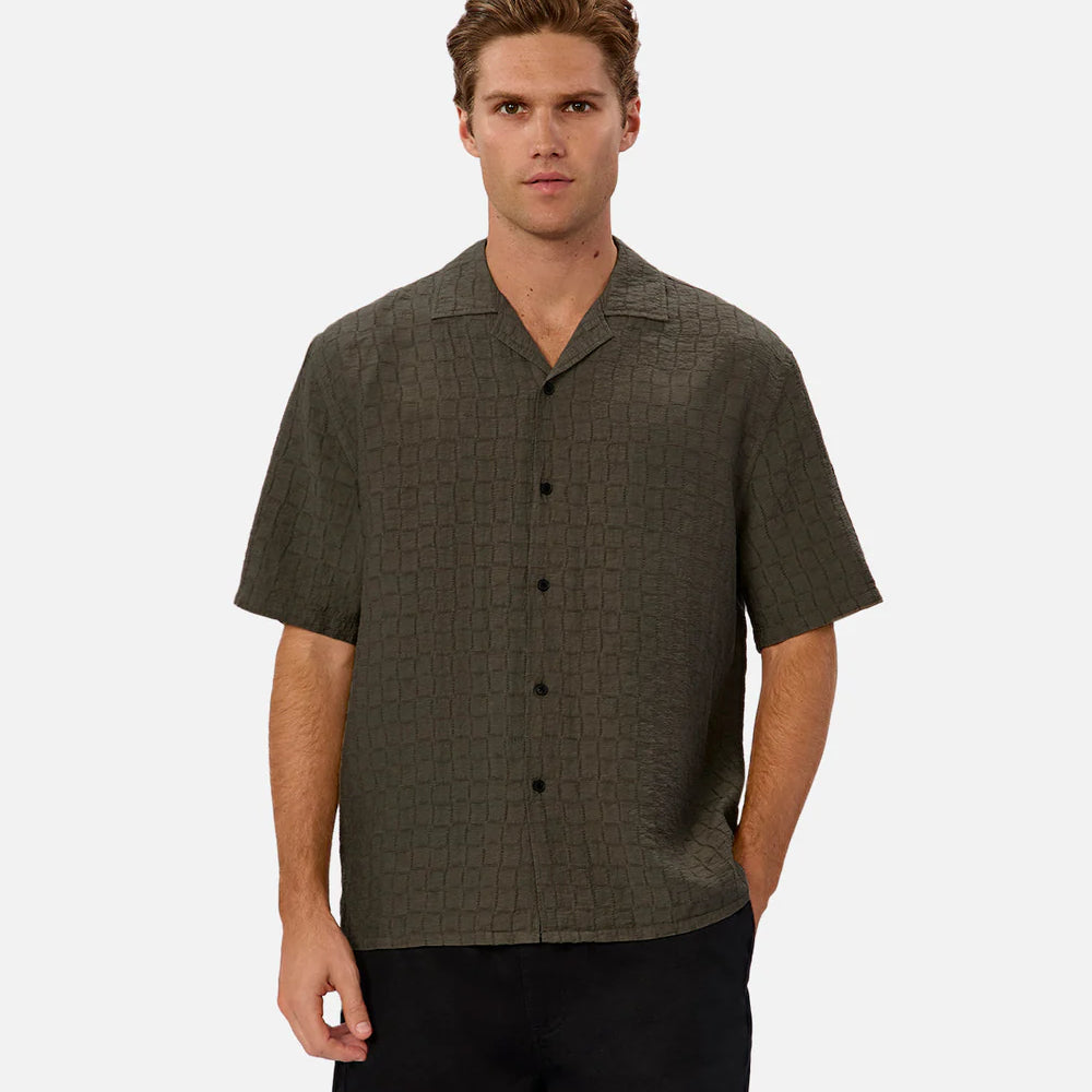 Dress up or keep things casual with the New Ortigia Short Sleeve Shirt by Industrie, now at Harbour Thread men's store in St. Pete, FL. 