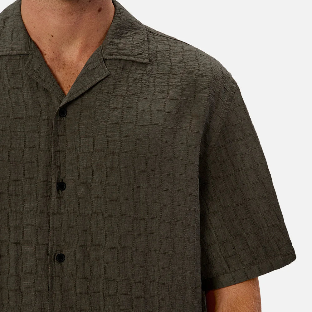 
                      
                        Green textured short sleeve camp collar shirt by Industrie
                      
                    