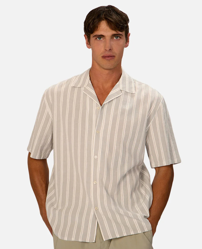 Now at Harbour Thread, the Striped Magna Short Sleeve Shirt from Industrie is ready for any warm-weather occasion, with a soft, textured finish and cool oversized fit.