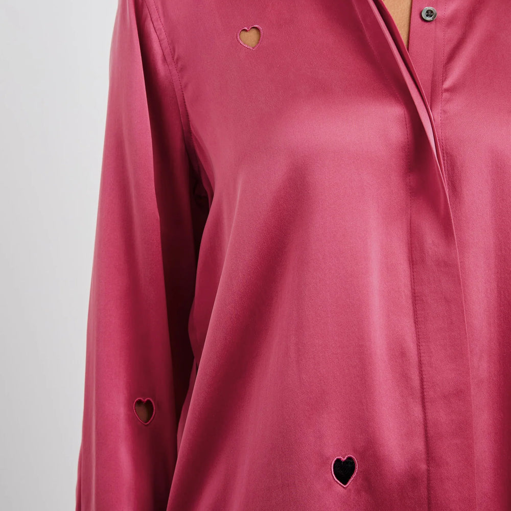 Women's pink satin button down shirt with heart cut-out details