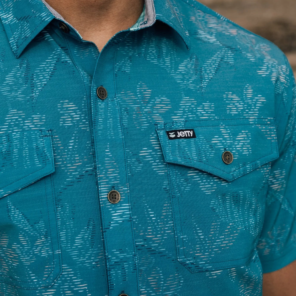 Man wearing Jetty's Wellspoint Oystex Shirt in the color/print Pacific