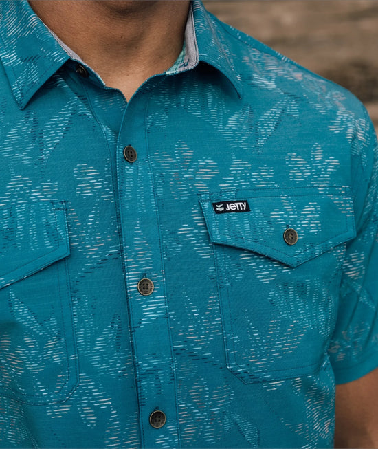 Man wearing Jetty's Wellspoint Oystex Shirt in the color/print Pacific