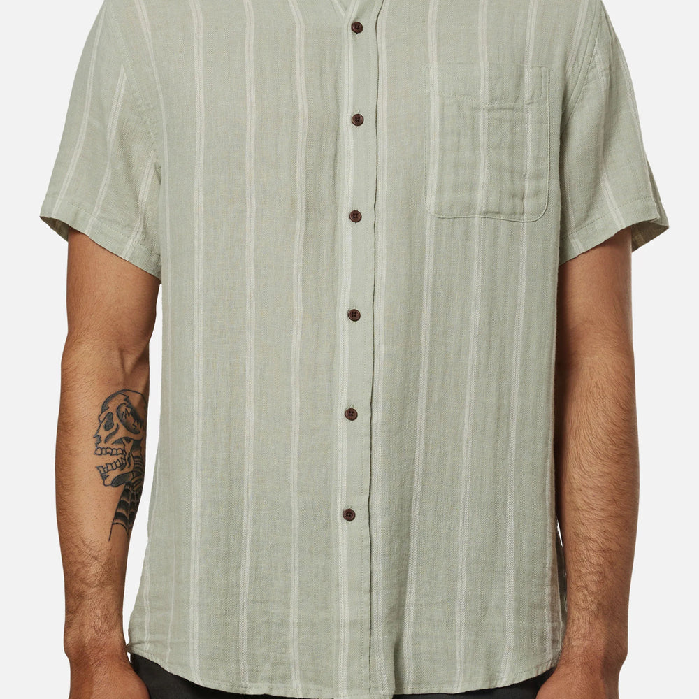 
                      
                        Men's light green short sleeve button down shirt by Katin
                      
                    