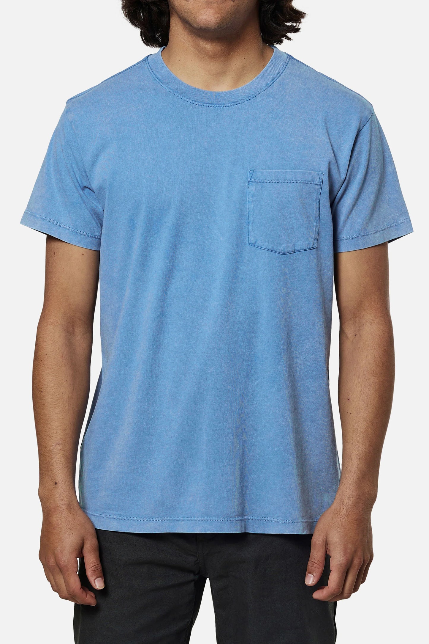 Front view of a man wearing a blue short sleeve pocket t-shirt by Katin