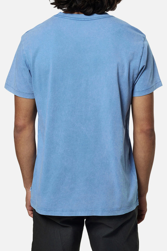 Back view of a man wearing a blue short sleeve pocket t-shirt by Katin
