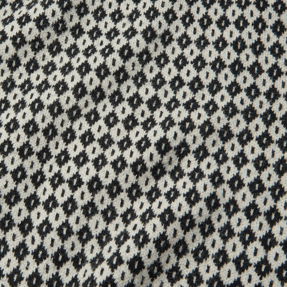 
                      
                        Check design detail on the Black Wash Check Sweater by Katin
                      
                    