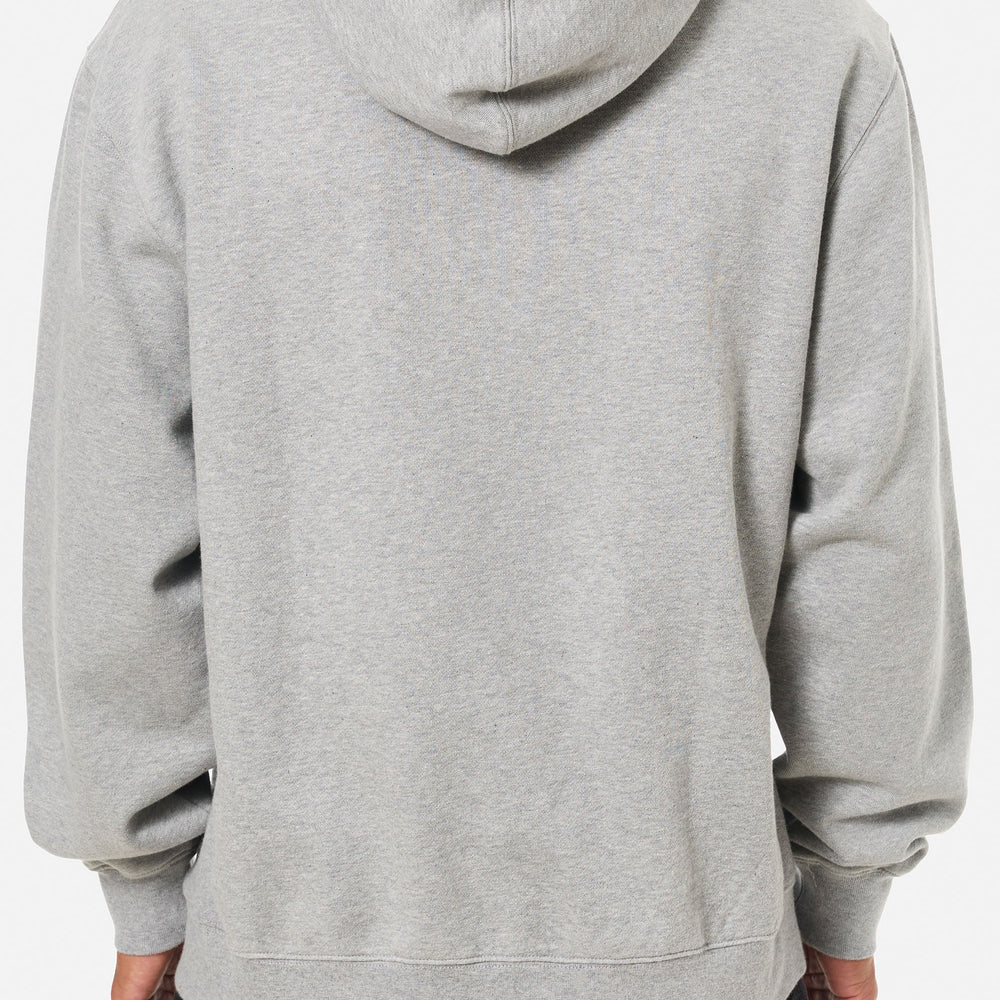 A man wearing the Heather Gray Embroidered Hoodie by Katin