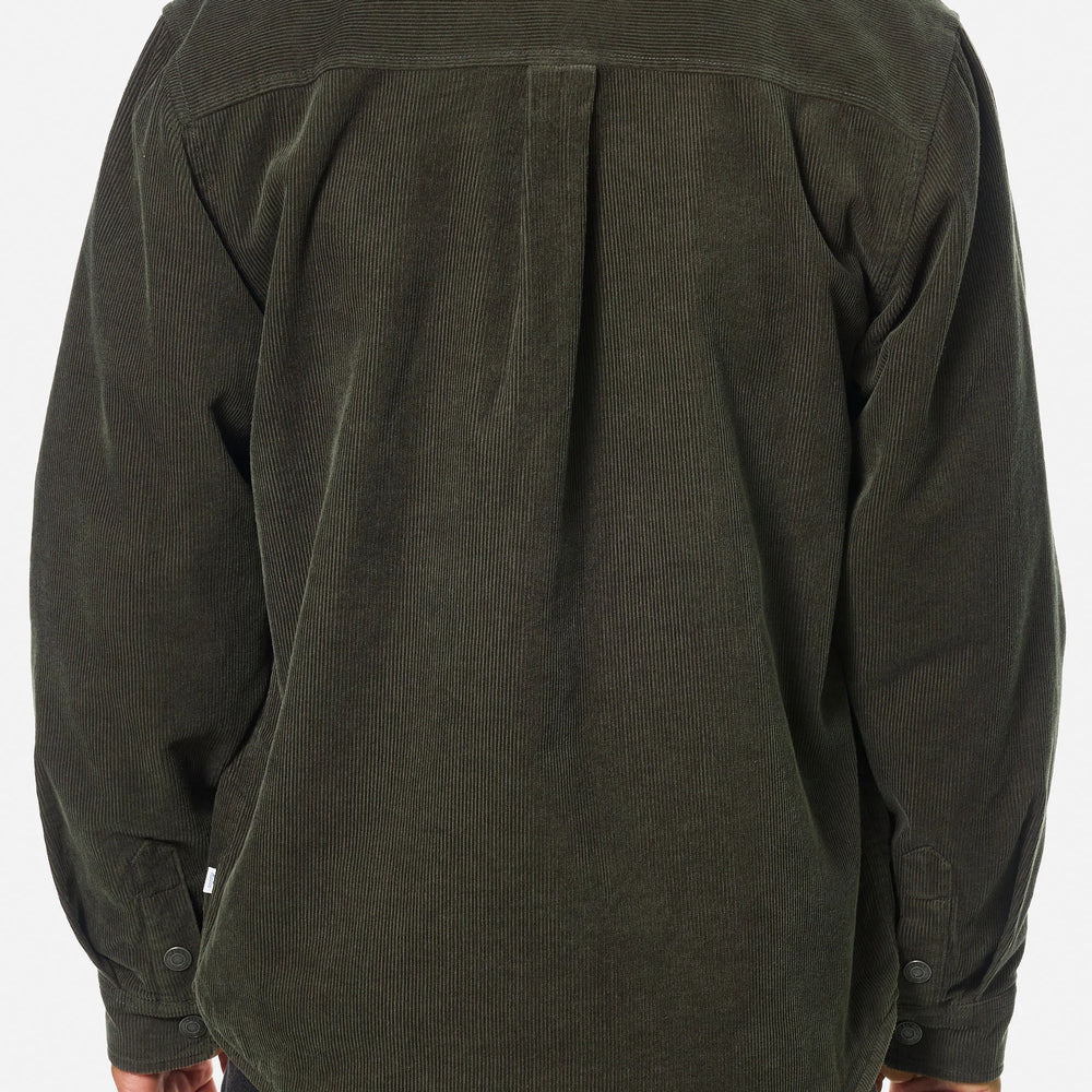 
                      
                        Man wearing a dark green corduroy shirt jacket from Katin
                      
                    