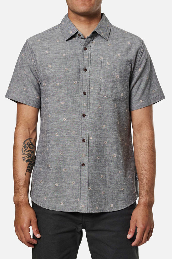 Front view of a black wash button up shirt with subtle floral dobby design by Katin