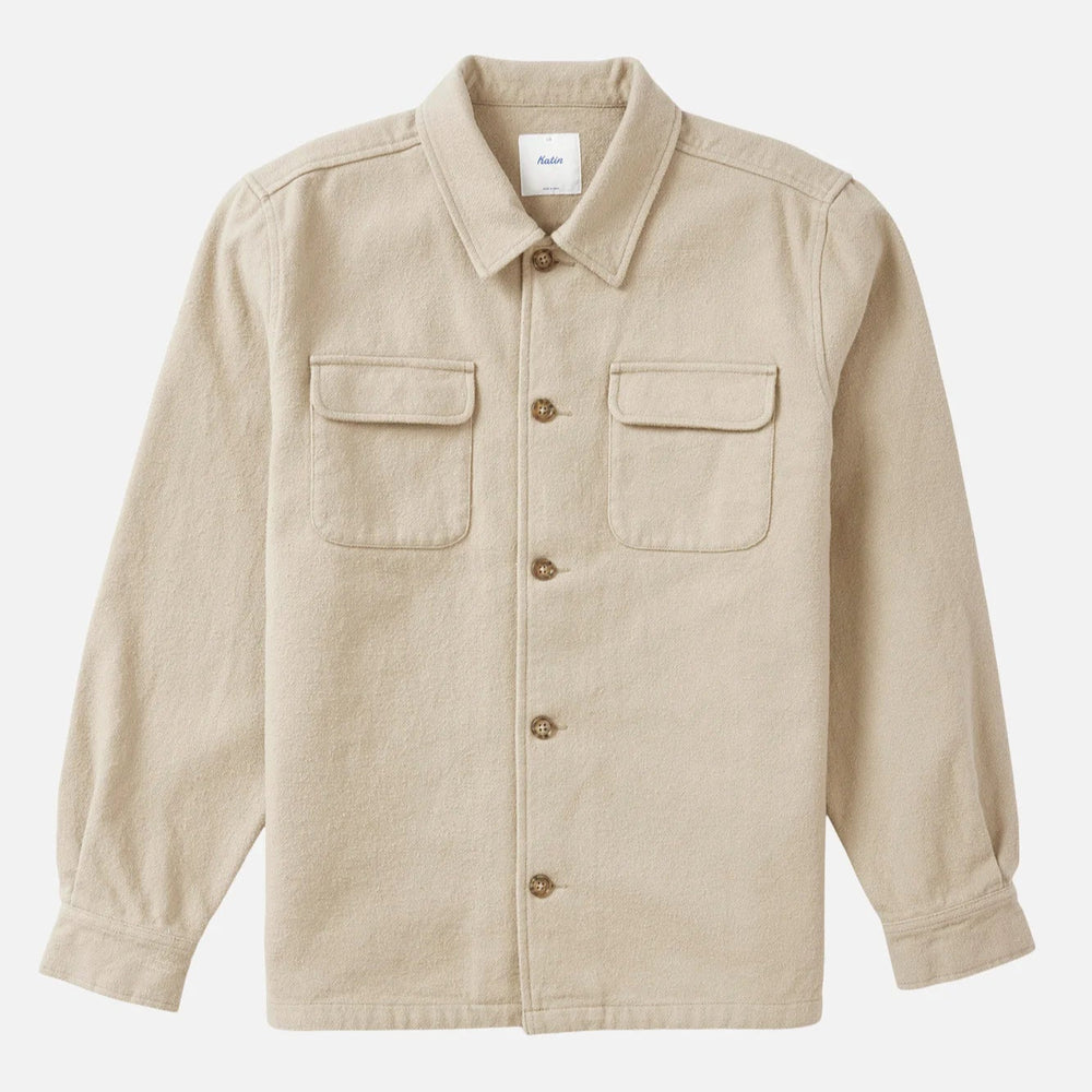 Beige shirt from Katin with collar and button details on a white background