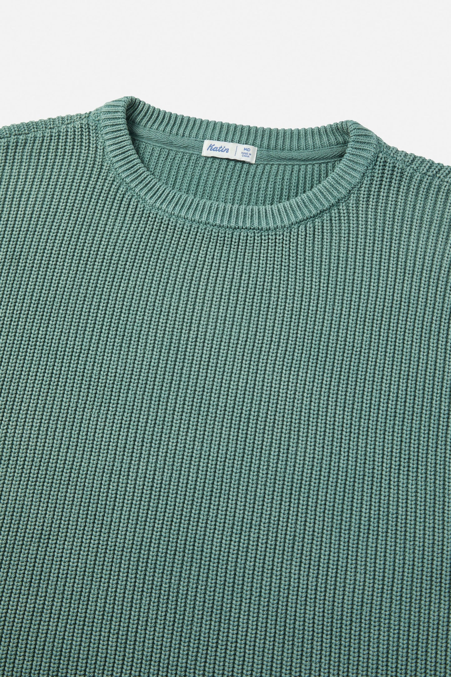 Front design detail on the Atlantic Green Swell Cable Knit Men's Sweater by Katin