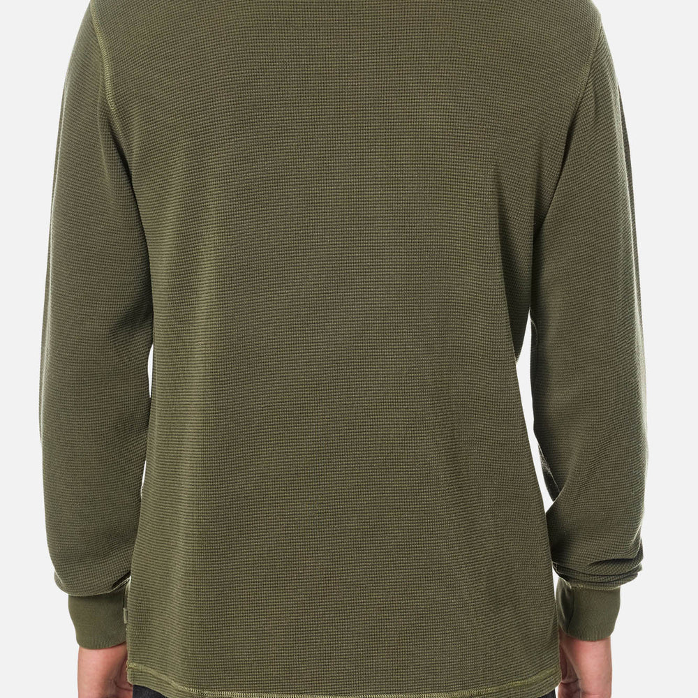 Man wearing a green long sleeve thermal by Katin