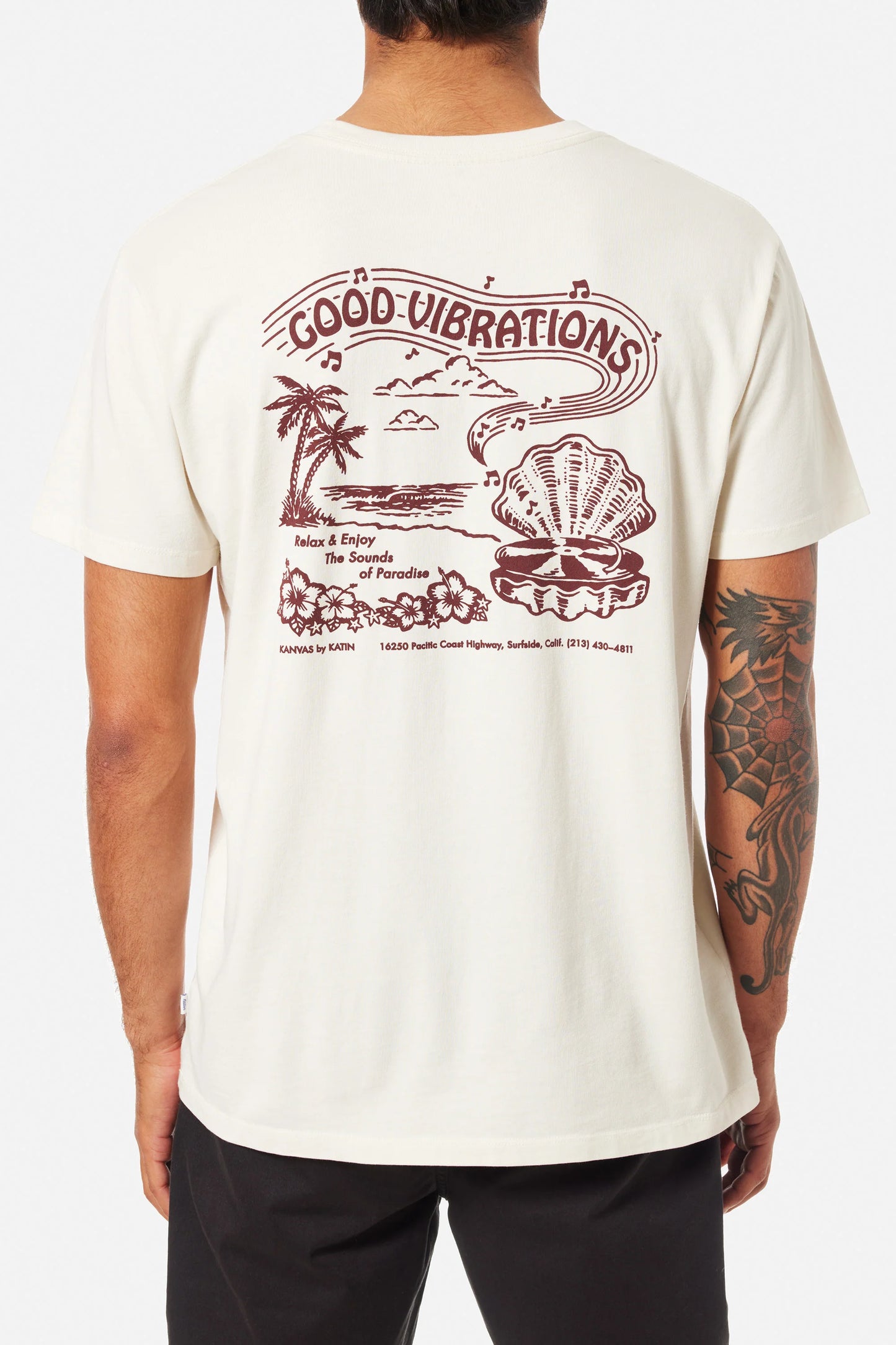 Men's off white short sleeve t-shirt with large beachy back graphic