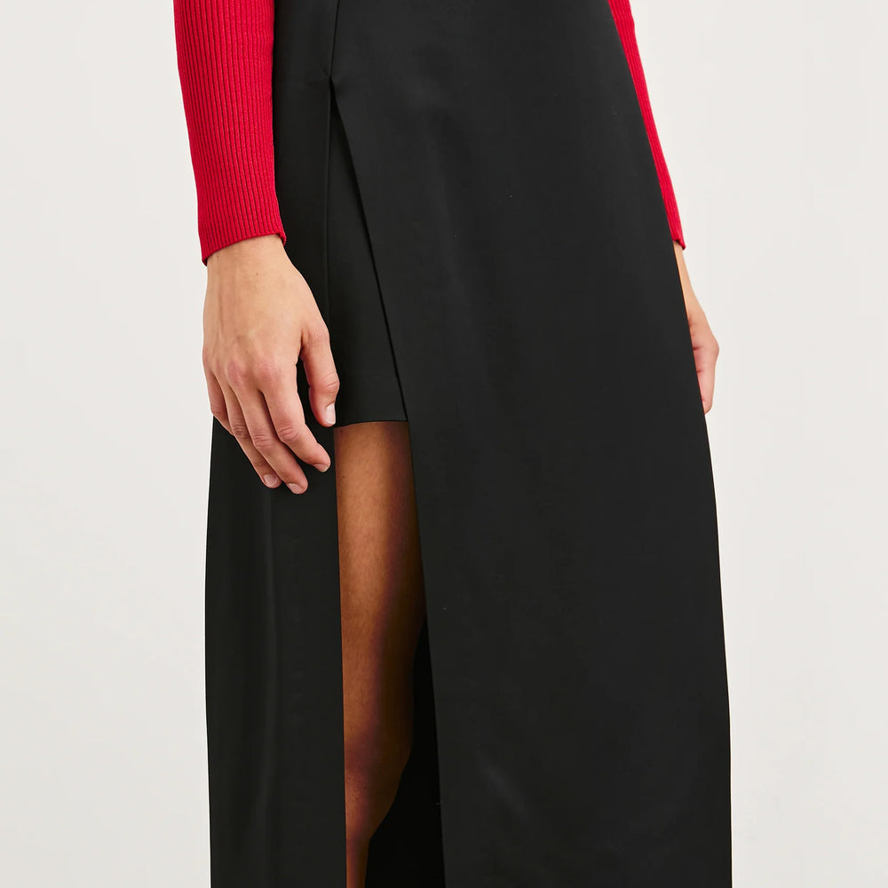 
                      
                        This unique pencil skirt offers a high waisted fit
                      
                    