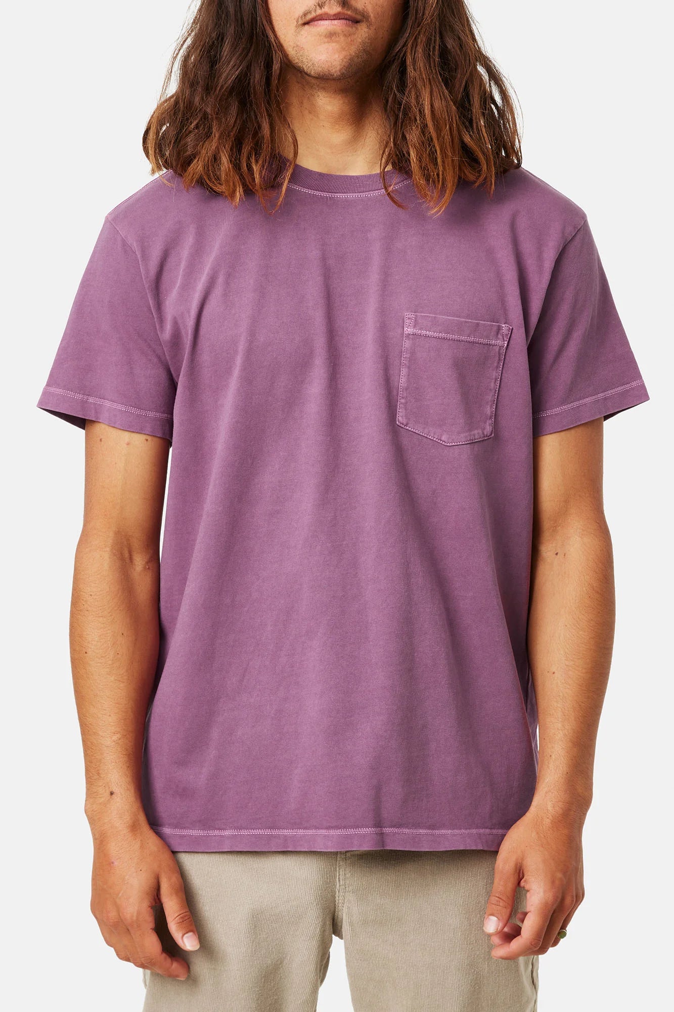 Front view of man wearing a short sleeve pocket tee in the color Kelp Red Sand Wash