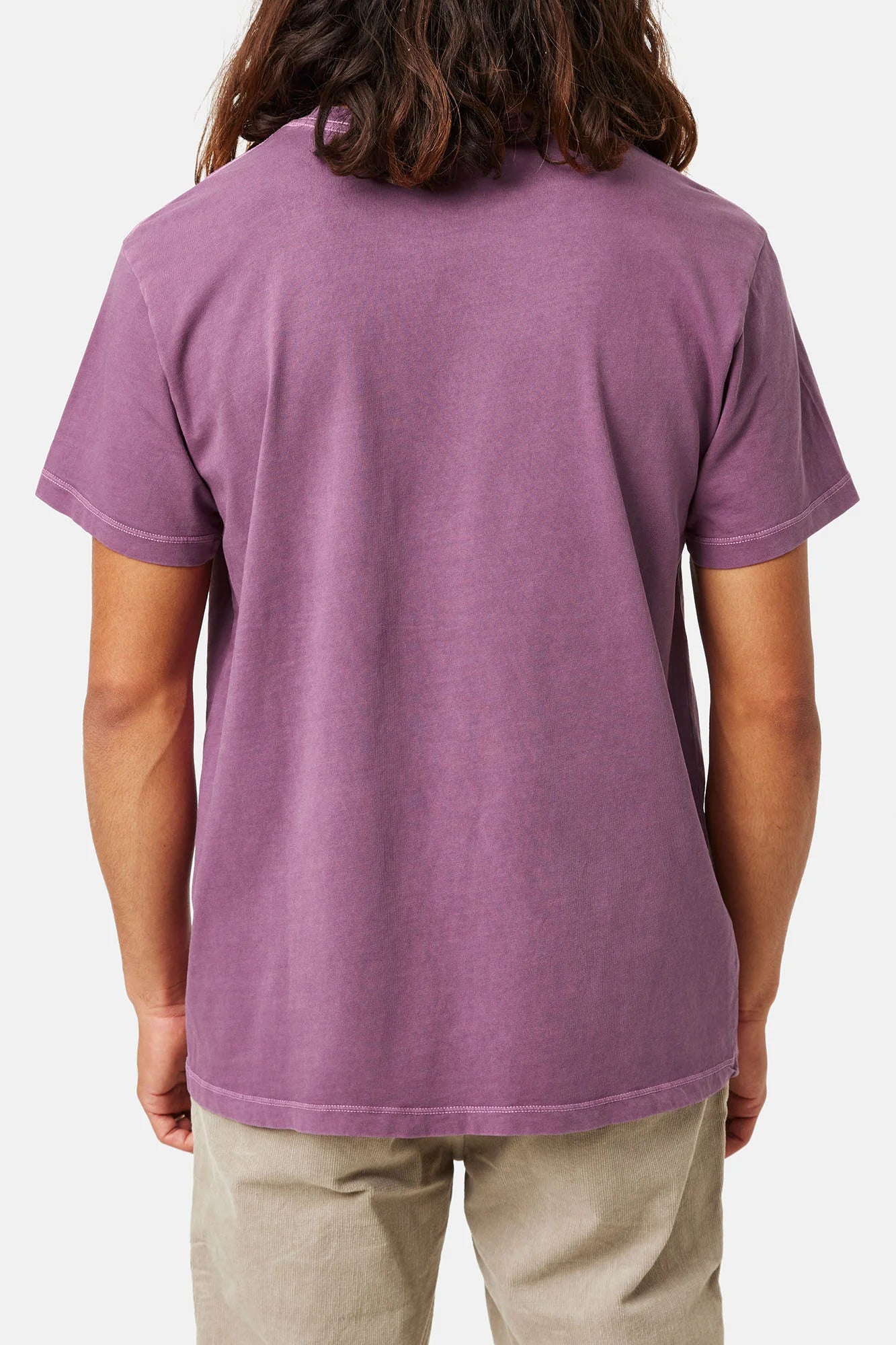 Back view of man wearing a short sleeve pocket tee in the color Kelp Red Sand Wash