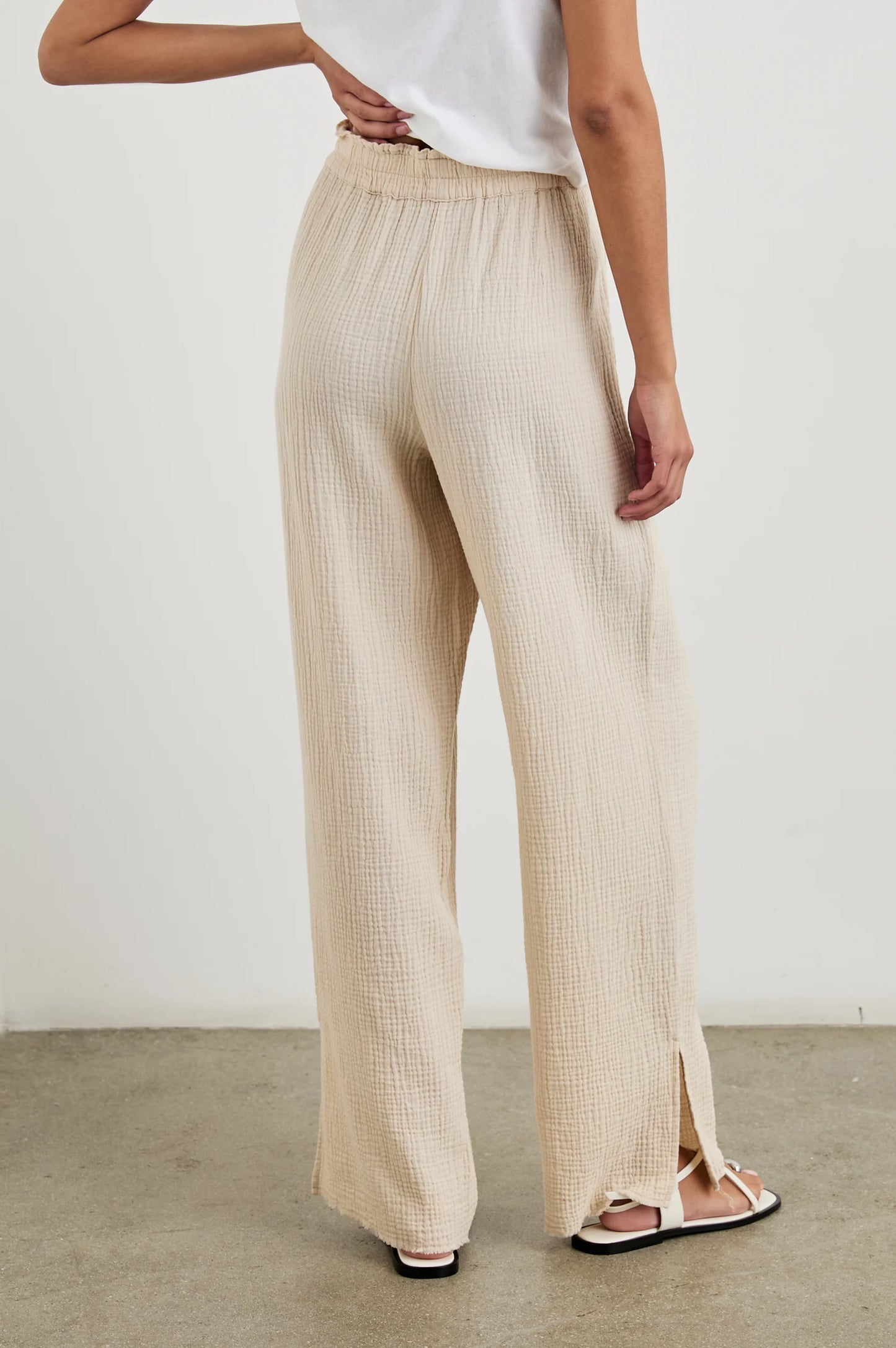 These women's pants from Rails feature flattering side slits at the outer leg opening and a smocked waistband for added comfort.