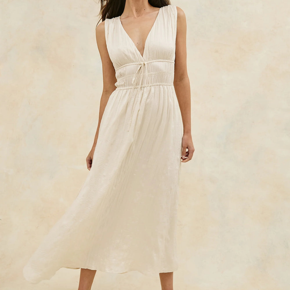 The Rails Lilith Dress is a striking midi style with a plunging neckline for a look that will turn heads at any event. Find yours at Harbour Thread boutique in St. Pete, FL. 