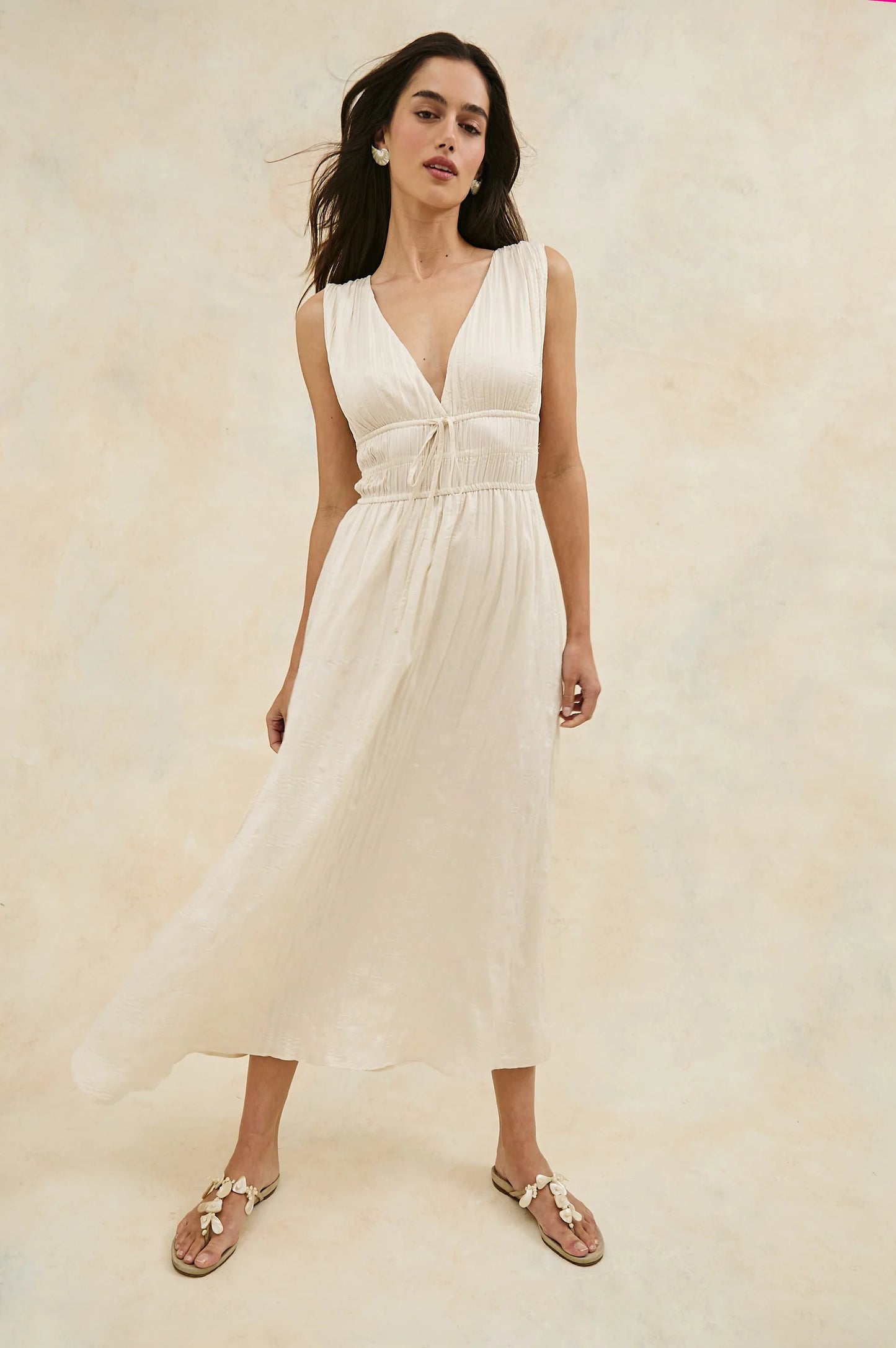 The Rails Lilith Dress is a striking midi style with a plunging neckline for a look that will turn heads at any event. Find yours at Harbour Thread boutique in St. Pete, FL. 