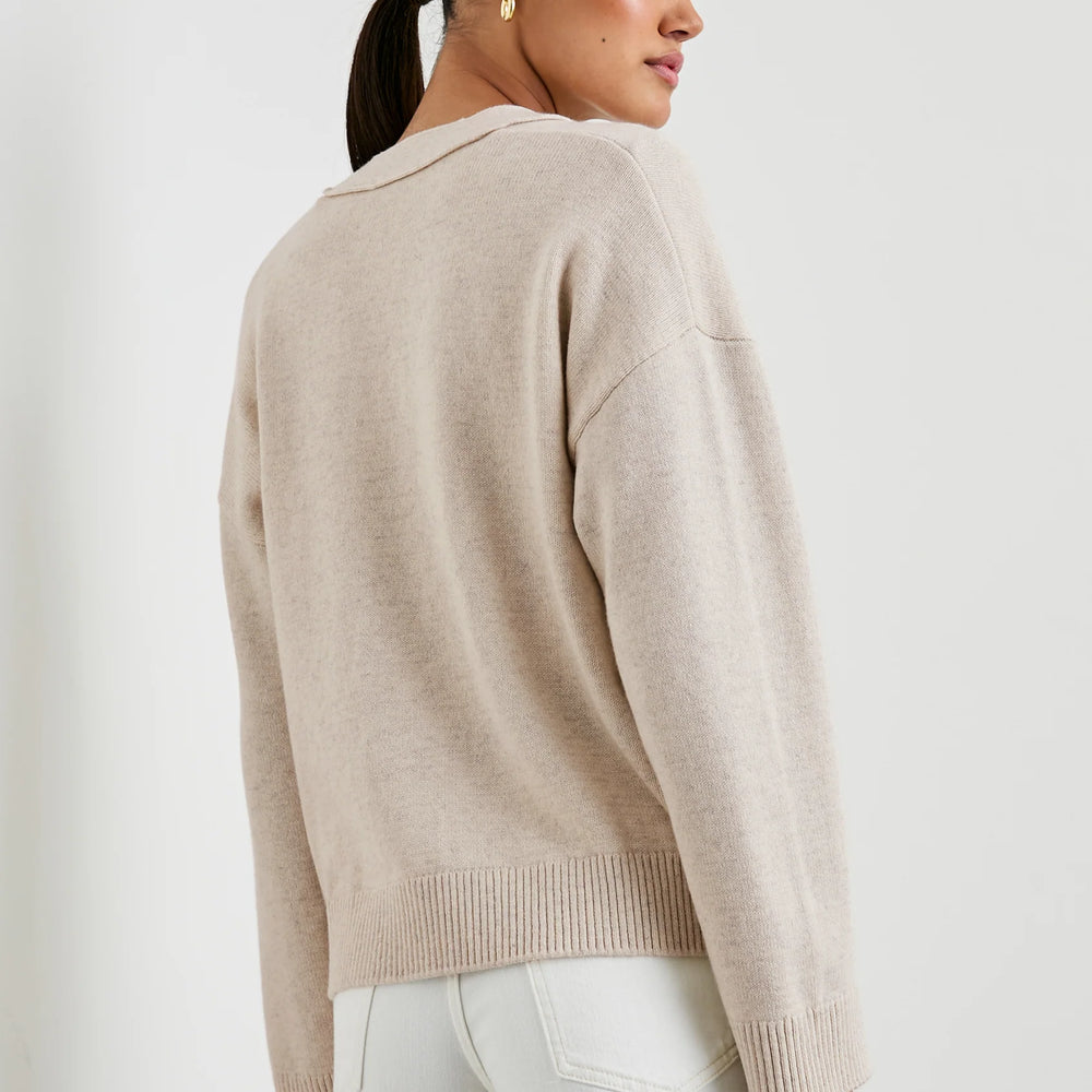 
                      
                        The Lind Cardigan features dropped shoulders and ribbed trims
                      
                    