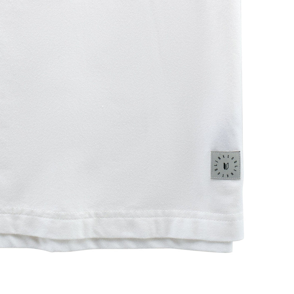 
                      
                        Bottom hem detail on the White Pacific Seawool Polo by LINKSOUL
                      
                    