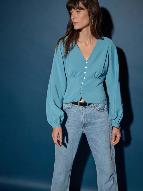 The Lyla Top features front button closure, long balloon sleeves and a v-neckline for effortlessly chic style. Shop this new arrival from Nation LTD at our Harbour Thread St. Pete location.