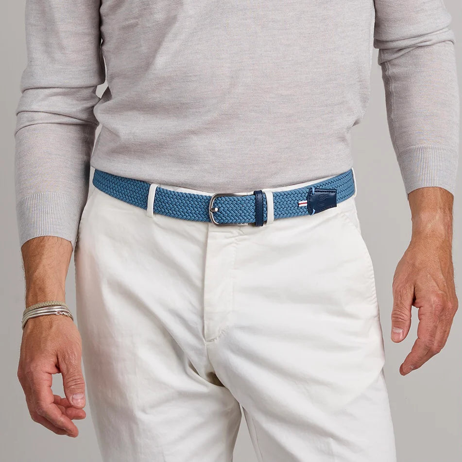 Man wearing the La Boucle Lake Como Belt in color Provincial Blue