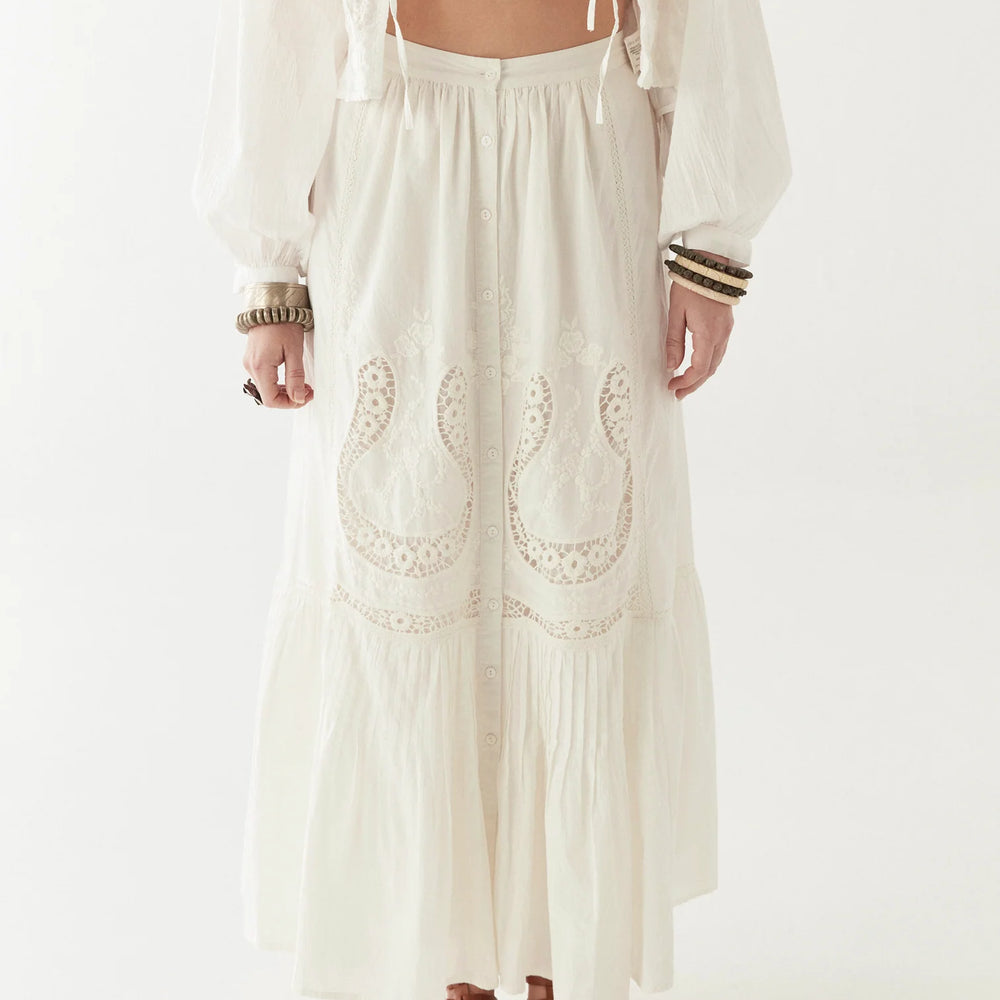 The crisp cotton Maison Hotel Luisa Skirt offers a perfect balance of structure and softness for your warm-weather style. Shop it at Harbour Thread boutique!