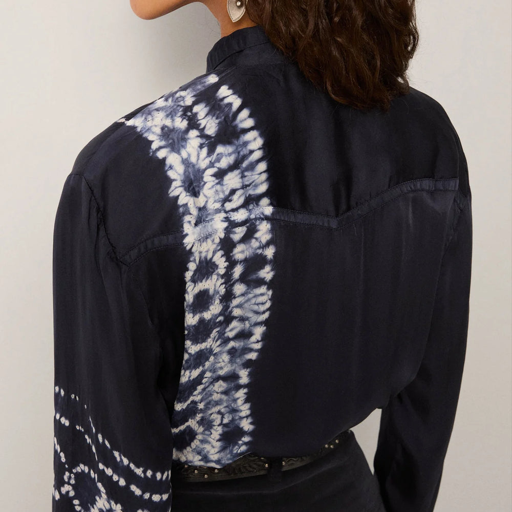 Navy blue shirt with white patterned shoulder detail on a plain background
