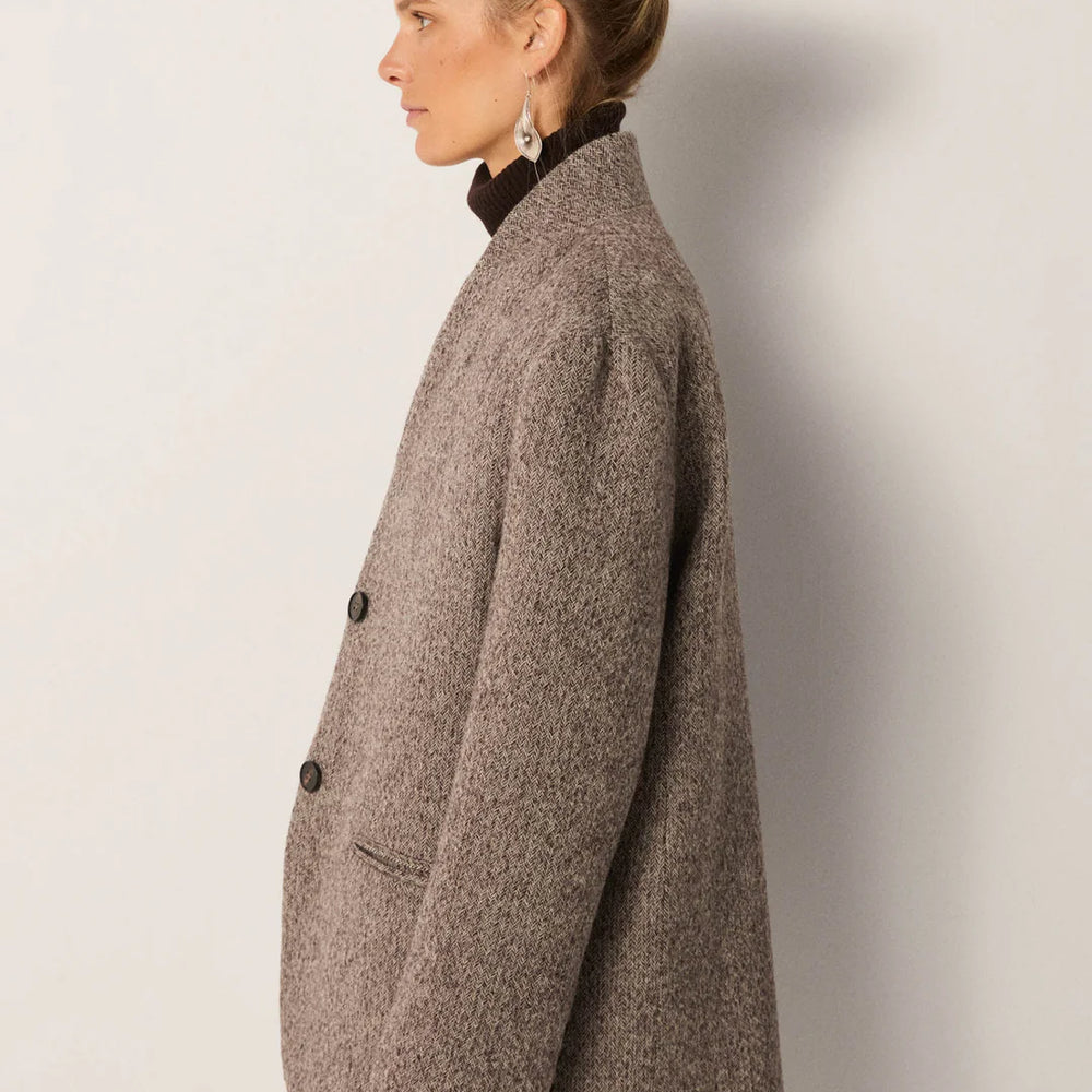 
                      
                        Woman wearing the Maison Hotel Clementine Jacket
                      
                    