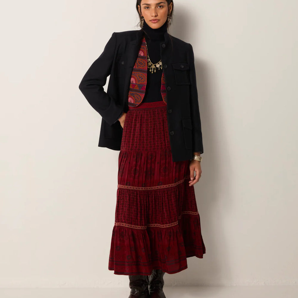 
                      
                        A woman wearing the Chateau Bordeaux Josephine Skirt by Maison Hotel
                      
                    