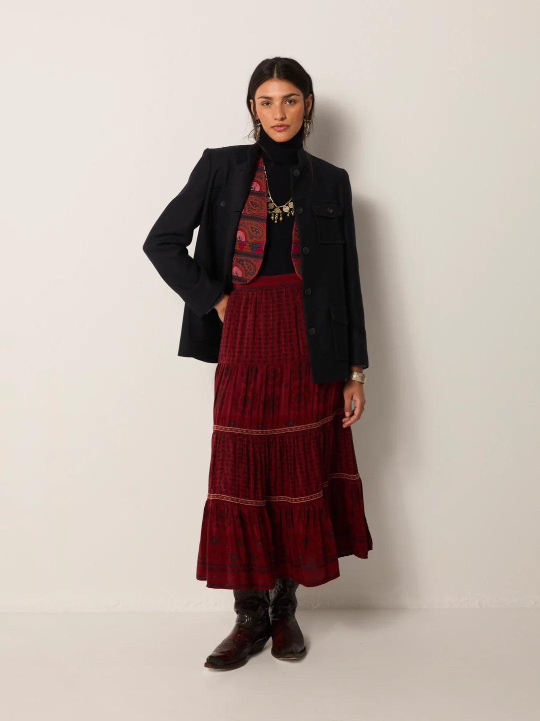 A woman wearing the Chateau Bordeaux Josephine Skirt by Maison Hotel