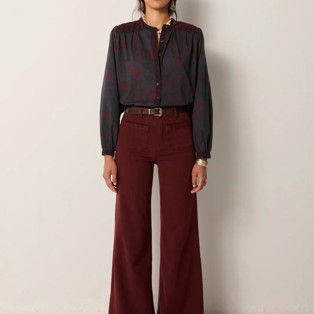 
                      
                        A woman wearing the Giuletta Pant in the color Capuleto Grape.
                      
                    