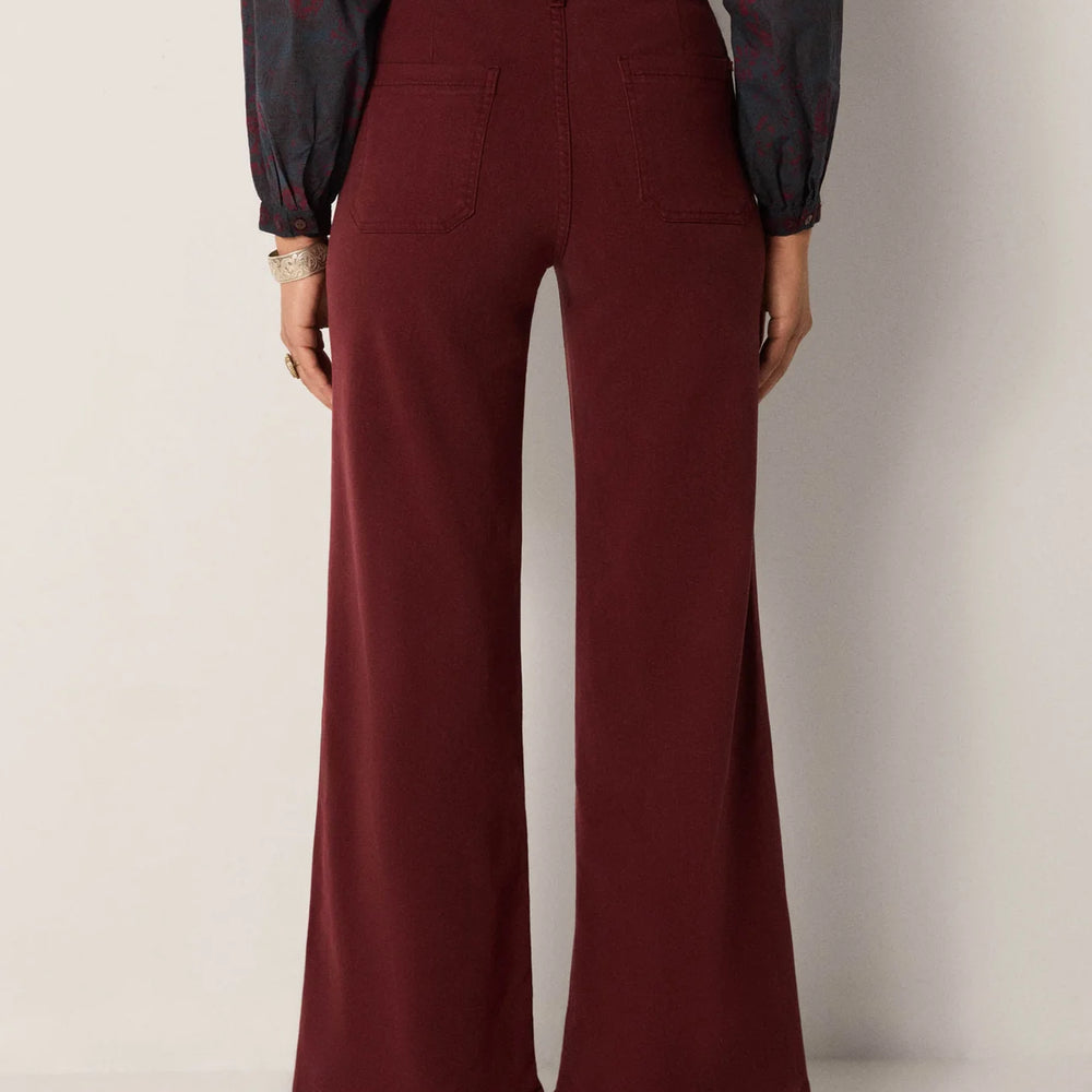 Wine-toned pants with slight flare leg