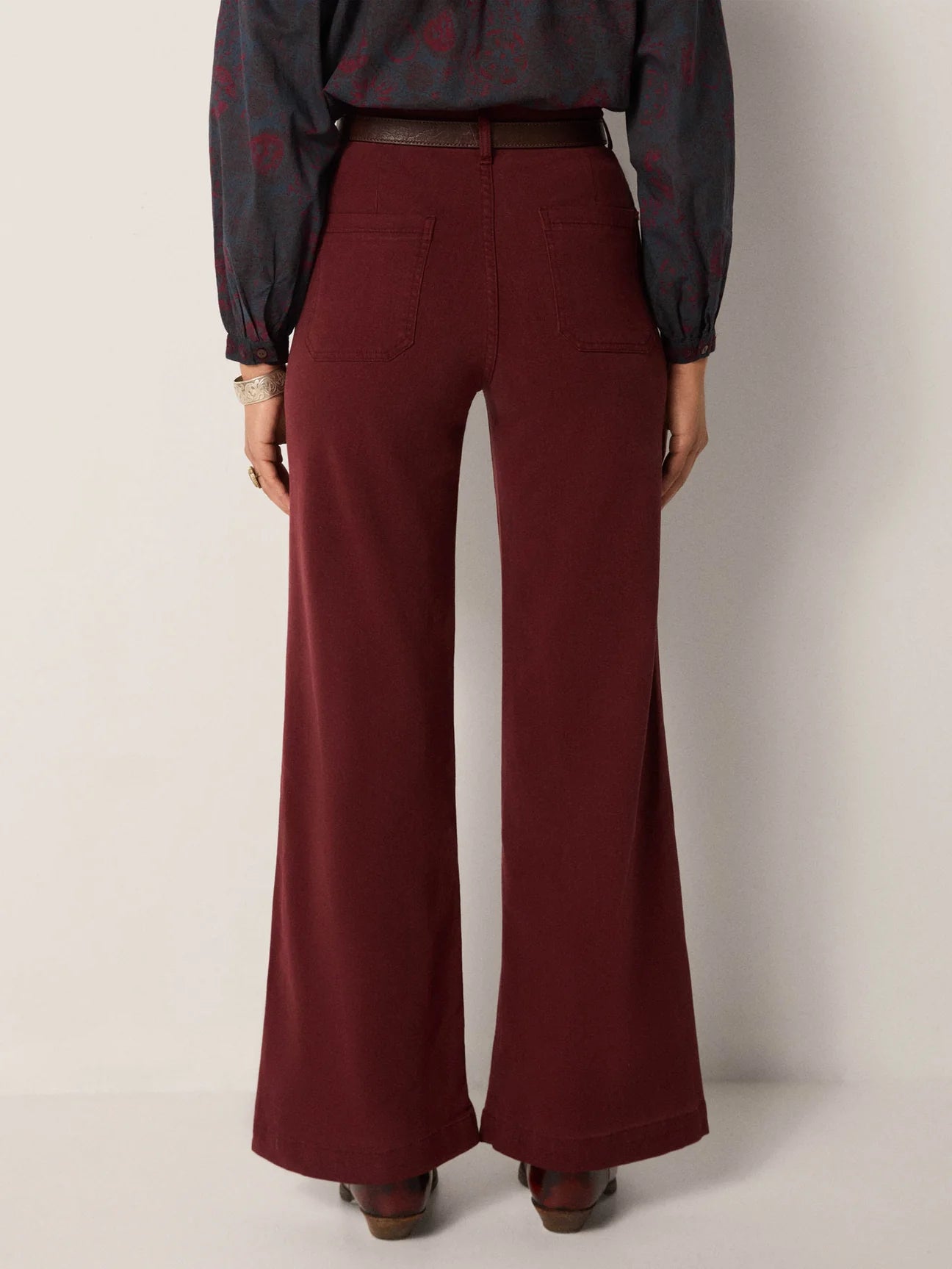 Wine-toned pants with slight flare leg